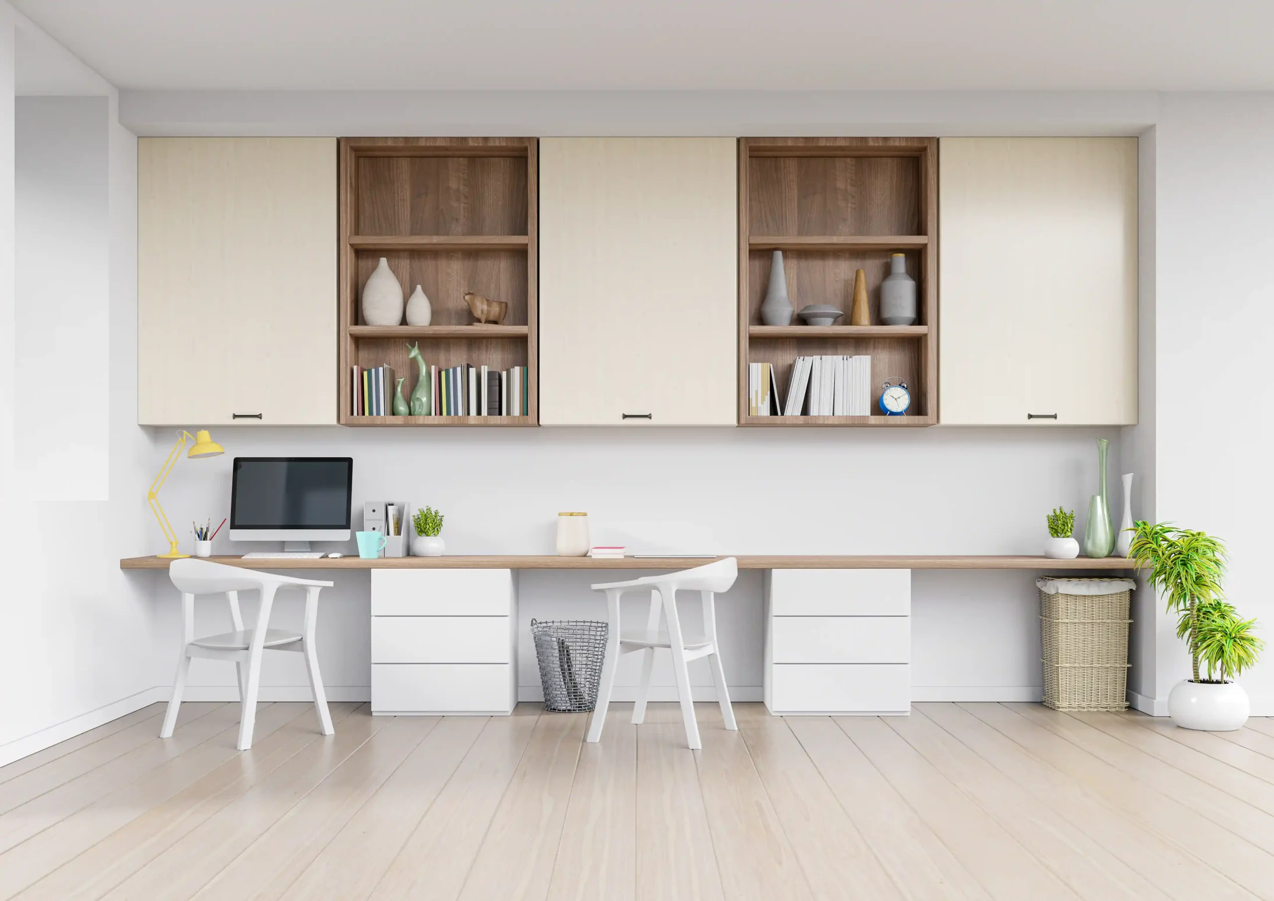 Minimalist home office with a long wooden desk and two white chairs. Shelves hold books and decor. Plants add greenery. Bright, neat, and modern.